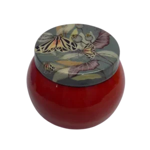 Round metal dryfruit jar with butterfly print lid