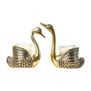 pair of swan brass candle holder