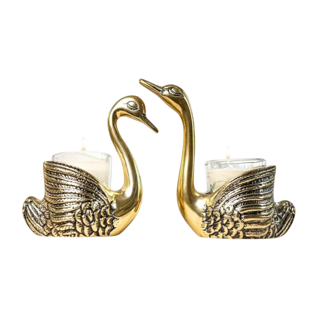 pair of swan brass candle holder