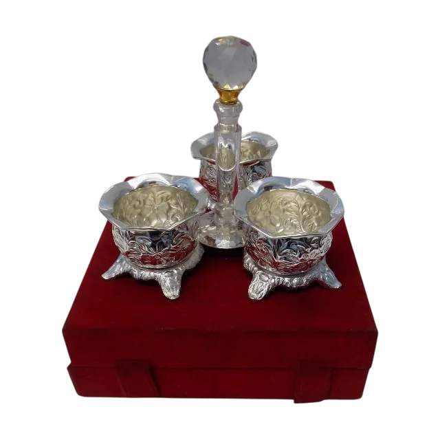 silver plated metal bowl with stand and spoon